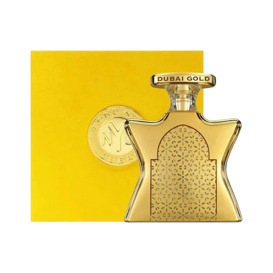 Perfume BOND DUBAI de BodegaPerfumera13 en frasco dorado con diseño geométrico y caja amarilla de fondo