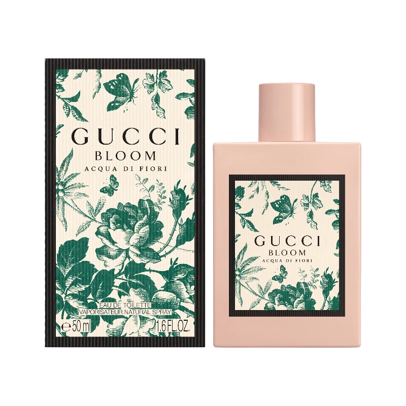 Perfume Gucci Bloom Acqua di Fiori de BodegaPerfumera13 con frasco rosa y caja decorada con flores y mariposas verdes