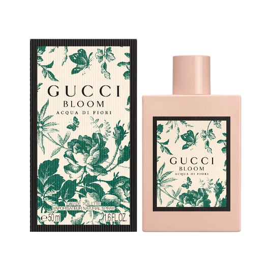 Perfume Gucci Bloom Acqua di Fiori de BodegaPerfumera13 con frasco rosa y caja decorada con flores y mariposas verdes