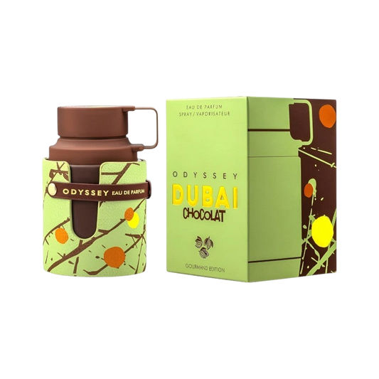 Perfume Odyssey Chocolate Dubai de BodegaPerfumera13 con frasco marrón y funda verde decorada junto a su caja