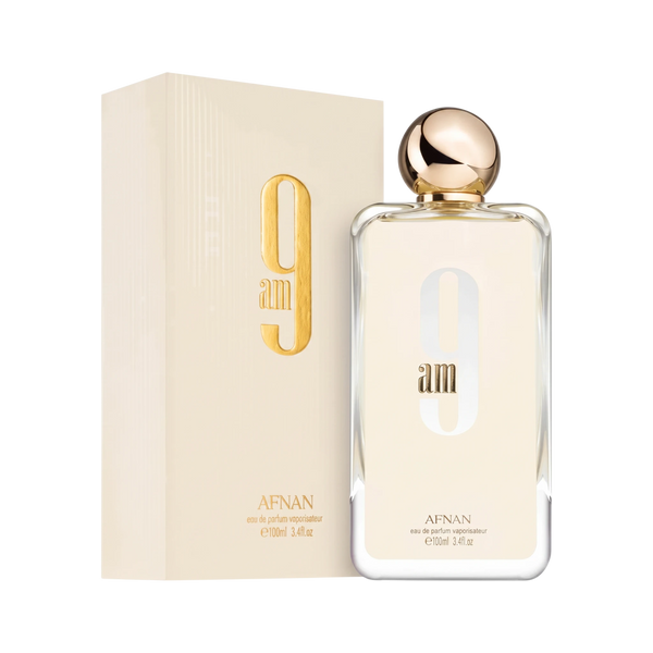 Perfume 9AM Afnan de BodegaPerfumera13 en frasco de cristal con tapón dorado y caja beige a juego