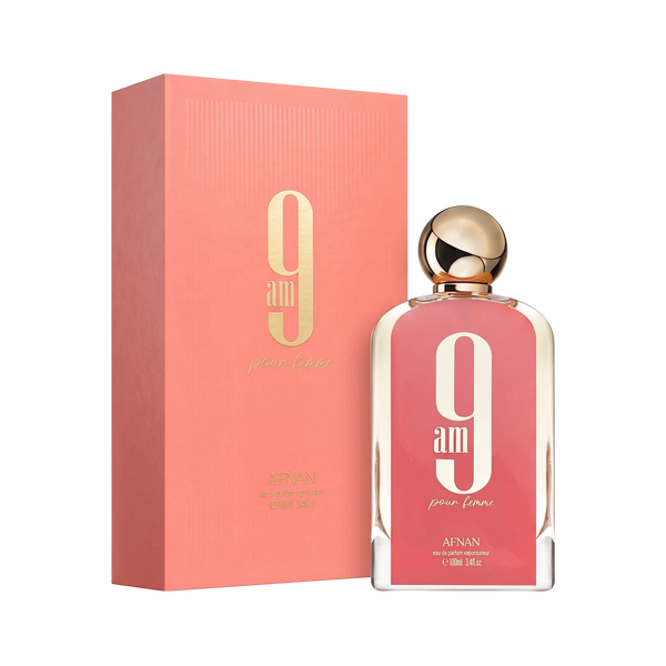 Perfume 9AM Pour Femme de BodegaPerfumera13 en frasco de cristal con tapón dorado y caja de presentación color coral.