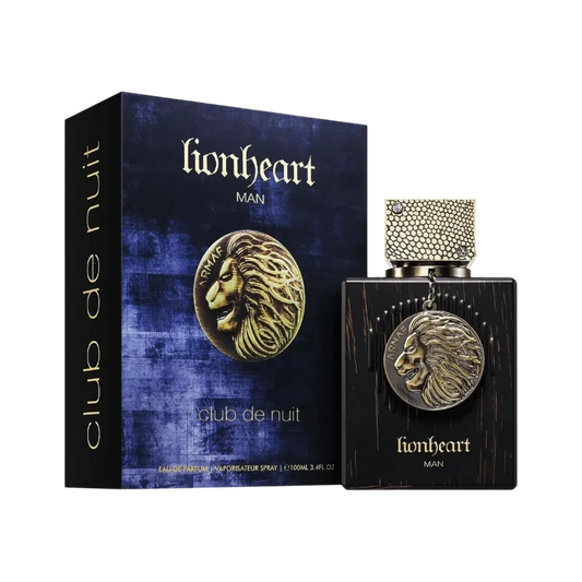 Perfume Lionheart Man de BodegaPerfumera13 con frasco negro, detalle de león dorado y caja azul texturizada.