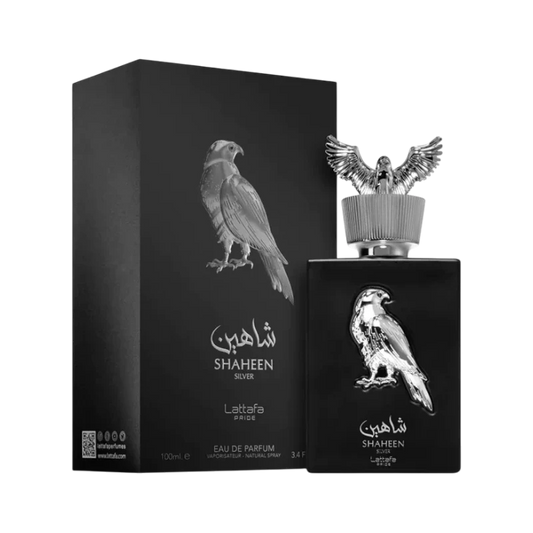 Perfume Shaheen Silver de BodegaPerfumera13 en frasco negro con tapón de halcón plateado y caja a juego