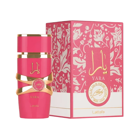 Perfume Yara Candy de BodegaPerfumera13 en frasco rosa vibrante con detalles dorados junto a su caja decorada