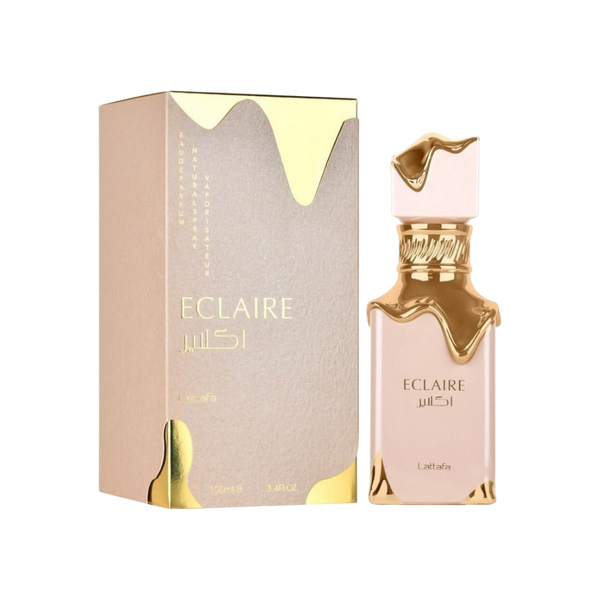 Perfume Eclaire Lattafa de KingParfumCol con frasco y caja en tonos beige y detalles dorados tipo caramelo derretido